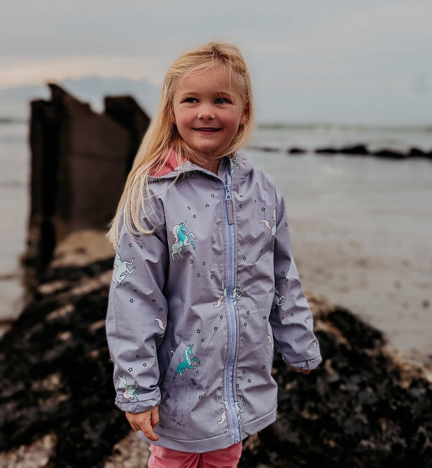 Holly and Beau - Unicorn color changing rain jacket